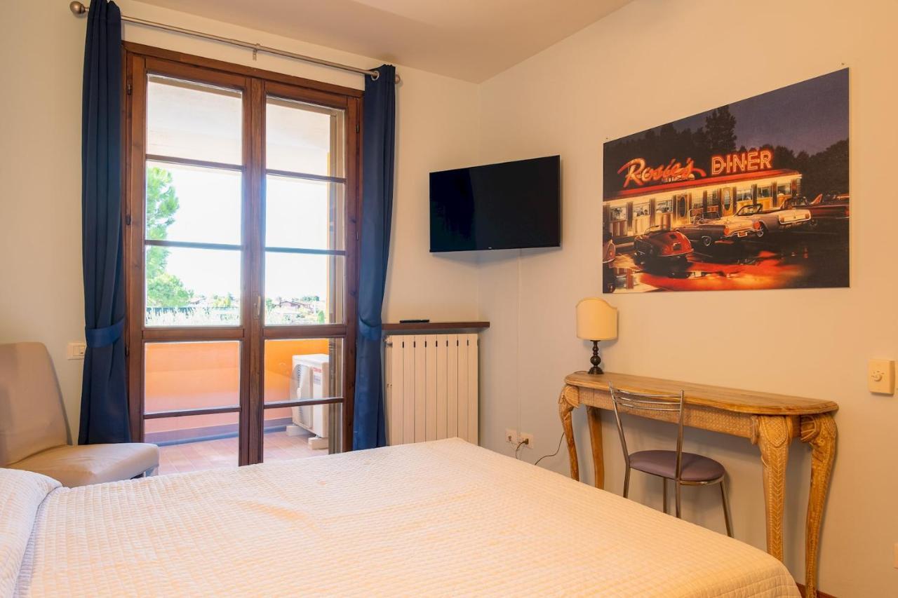 Appartement La Casa Sul Porto - Italian Homing à Sirmione Extérieur photo