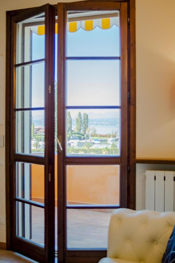 Appartement La Casa Sul Porto - Italian Homing à Sirmione Extérieur photo